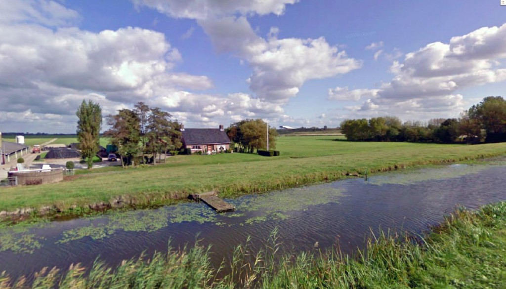 Zicht vanuit de Zoetermeerse Meerpolder met aan de horizon de skihelling